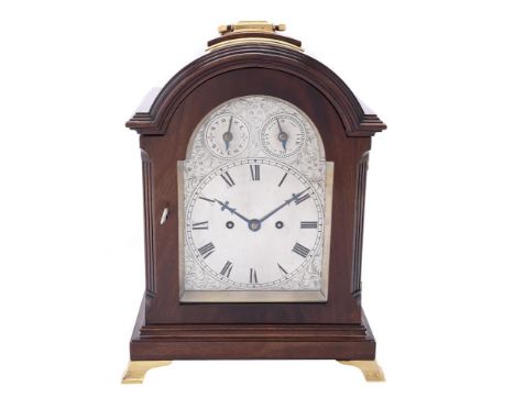 A mahogany cased bracket clock, in George III style, 20th century, with twin fusee gong striking movement, the silvered arche