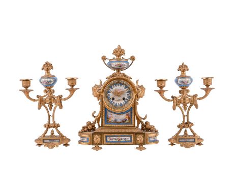 A French gilt metal and Sevres style porcelain mantel clock garniture, Japy Freres, second half 19th century, with eight-day 