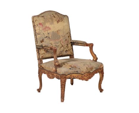 A French parcel gilt and tapestry upholstered armchair in mid 18th century style, Provenance:From the private office of the l