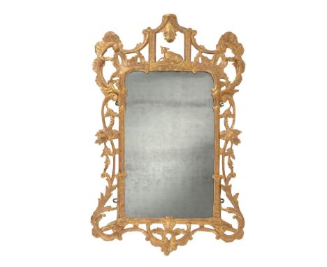 A carved giltwood wall mirror in George III style, 19th century, after the manner of Thomas Chippendale, 125cm high, 79cm wid