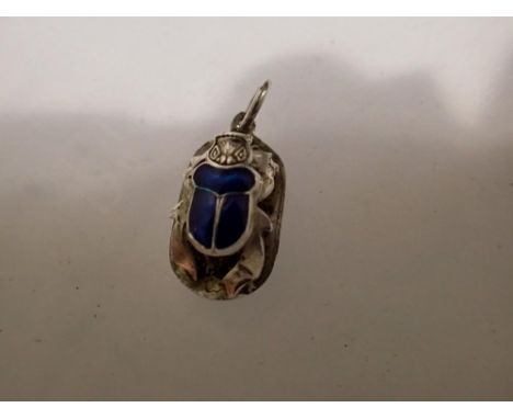 White metal and blue enamel scarab beetle pendant with egyption hyroglifics to back. UK P&amp;P Group 1 (£16+VAT for the firs
