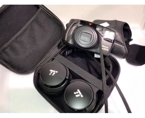 Cased TT headphones model no TTBH040 and a Pentax zoom 105-R camera. Not available for in-house P&amp;P 