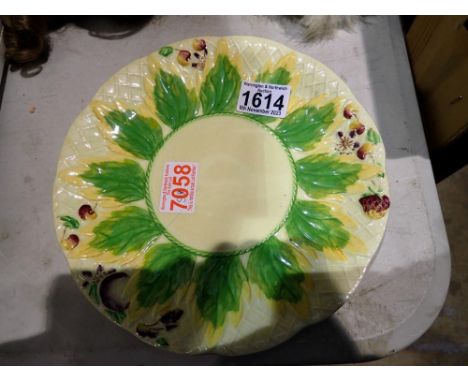 Clarice Cliff for Newport pottery plate in the leaf and berries pattern, D: 18 cm, light crazing, minor chips to base. Not av