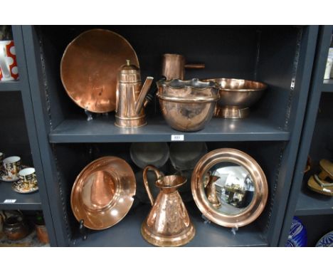 A selection of antique and later copper wares including convex bullseye mirror, bowls, jug and four section cooking pan