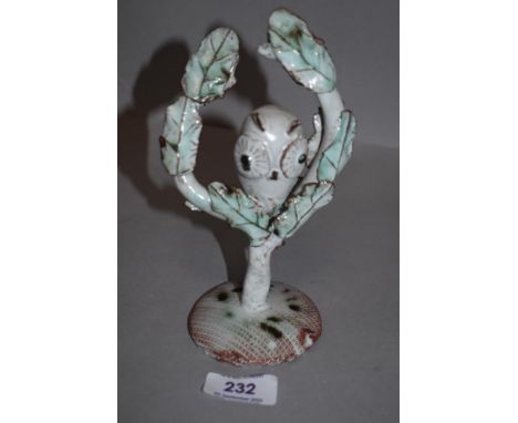A Stanislas Reychan ceramic studio pottery sculpture of an owl in tree