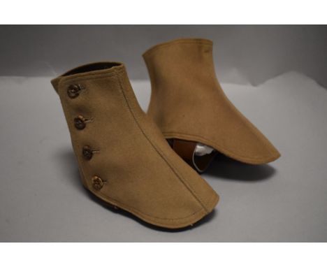 A pair of Gaiters, button fastening to sides, leather strap to base