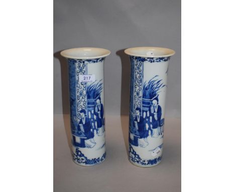 A pair of Chinese porcelain tall stem vase both decorated in blue and white with four character seal marks to base depicting 