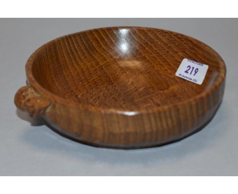 A 20th century Robert Mouseman Thompson golden oak nut bowl from the Kilburn  workshop having carved mouse signature to side