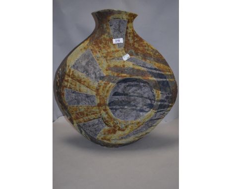 A Julian King Salter large mid century studio pottery vase having indented sides with a fat lava glaze
overall very good.