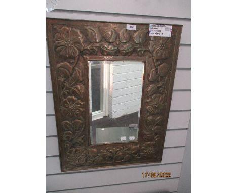 A genuine Victorian Arts and Crafts hall way mirror in the manner of Keswick school of Industrial arts having hammered copper