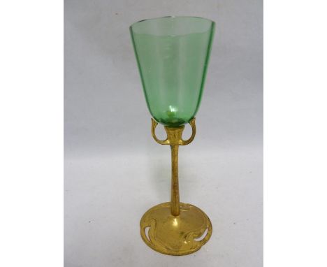 Austrian- a Jugenstil gilded metal and glass wine glass, the ribbed sea green glass bowl on a gilded Art Nouveau tripod toppe