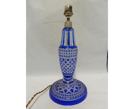 Bohemian- a glass lamp base, of blue overlay cut through to colourless glass with hobnail and diamond bands, fitted for elect