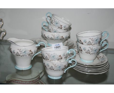 An Aynsley Teaset for six comprising six cups and saucers, tea plates, sugar bowl, milk jug and bread and butter plate, white