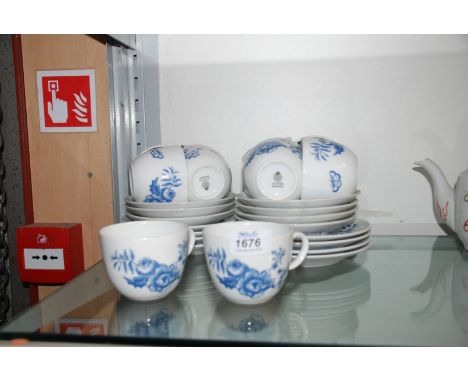 A part Royal Worcester ''Rhapsody'' design part Teaset, blue and white and comprising ten Cups and saucers and eight Tea Plat