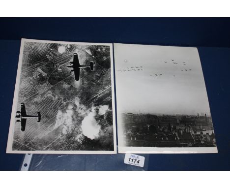 A period WWII, 10'' x 8'' approx. black and white aerial Photograph, an atmospheric scene of the London Blitz, with two Dorni