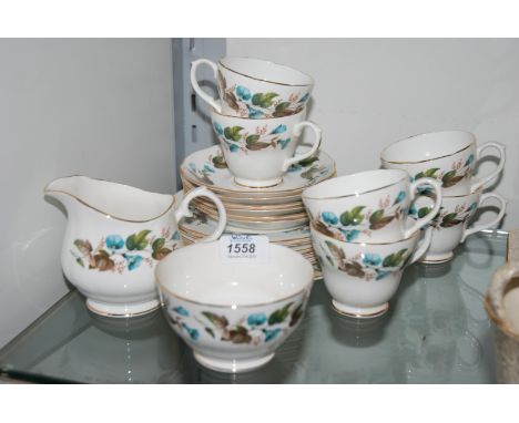 A Duchess bone china Teaset, white ground with blue convolvulous flower pattern and comprising six Cups and saucers, six Plat