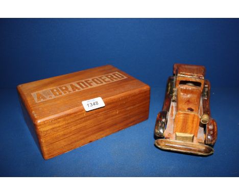 A Cigar Box and a wooden model of a  Car