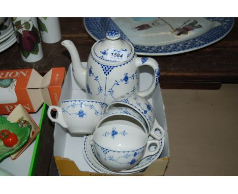 A Furnivals Ltd blue and white part Teaset comprising six saucers, four cups and coffee pot.