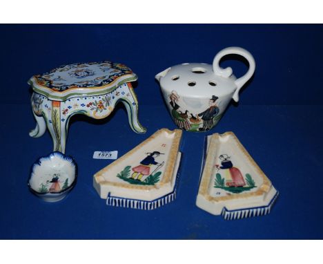 A pair of Quimper ashtrays and a Quimper pin Dish a/f, a Faience lidded pot of table form standing on four legs (chip to rim 