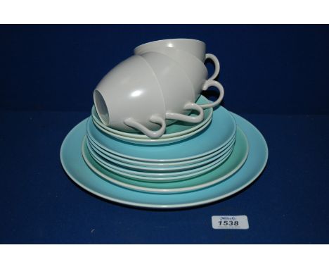 A matched Poole part Teaset including four cups, two saucers, five side plates, sandwich plate, etc.