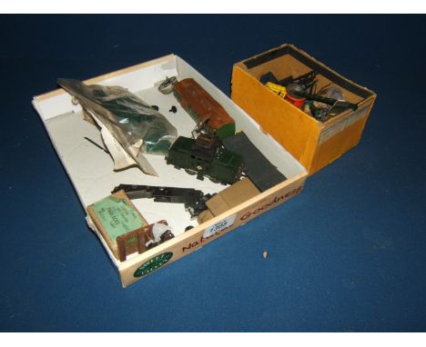 A quantity of miscellaneous spare parts for Hornby and Triang engines, an unmade Airfix model, etc.