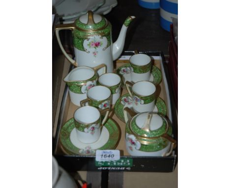 A Noritake Coffee set, white ground with green banded floral decoration, comprising five coffee cans and saucers, and coffee 