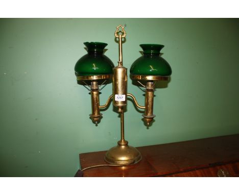 A brass based Clerk's double Lamp with green shade (one shade damaged)