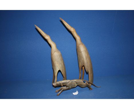 A pair of Horn Birds, 16" tall and a similar model of a Hound, 