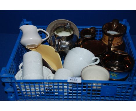 A quantity of Lustreware and Poole Pottery including Poole Coffee Cups and saucers, Lustre Jugs, etc.