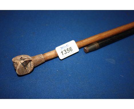 Two items of Militaria being an Officer's Swagger Stick and a wooden Walking Stick with carved owl head handle