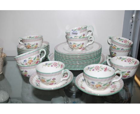 A Minton ''Haddon Hall Trellis'' design Teaset comprising ten Cups and saucers, ten tea Plates, and a bread & butter Plate
