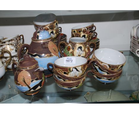A quantity of Japanese Satsuma Ware including a part Tea Set comprising eleven Cups and saucers, eleven Tea Plates, Sugar Bow