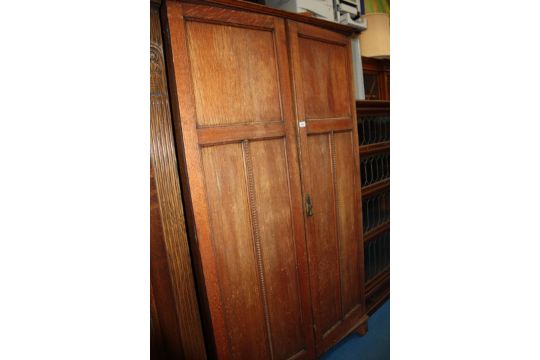 A 1940 S Oak Fitted Double Doored Alwyn Wardrobe Having