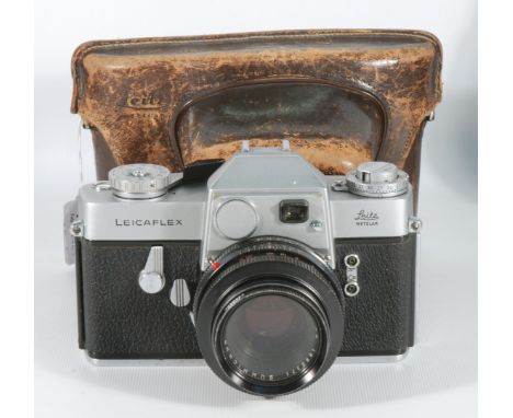 A Leitz Leicaflex SLR - serial No 1127940 -  with Summicron-R  50mm f/2 Lens fitted with Leica series Vl UV Filter.  Leather 