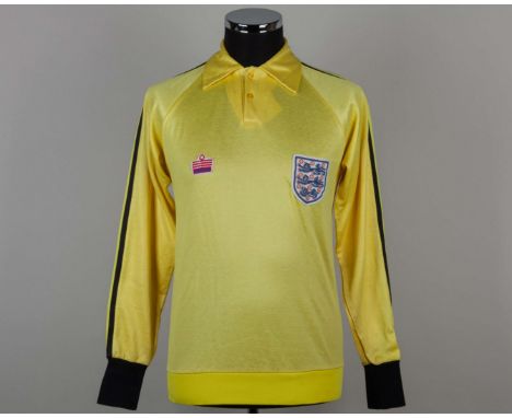 Joe Corrigan yellow and black No.1 England goalkeepers long-sleeved shirt, Admiral, 38-40, with button-up collar and embroide