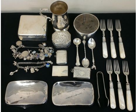 A collection of hallmarked silver items, to include two vesta cases, a pill box, a christening cup, two backs from hand brush