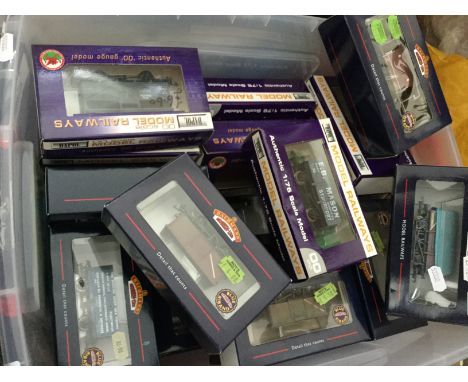 A carton of boxed Bachmann and other rolling stock to include brake van, wagons etc