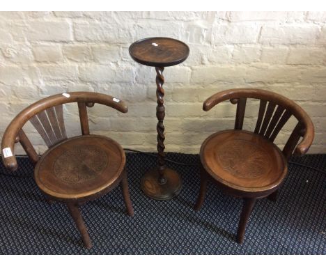 A pair of bent wood children's chairs with engraved seats, together with a wine stand on spiral support.