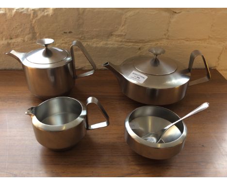 An Old Hall designed by R. Welch stainless steel tea set including tea pot, coffee pot, sugar bowl with spoon and milk jug.