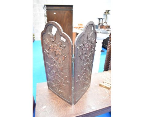 A carved poker work firescreen