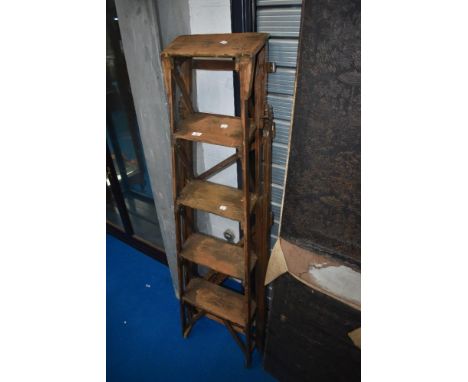 A set of vintage wooden step ladders