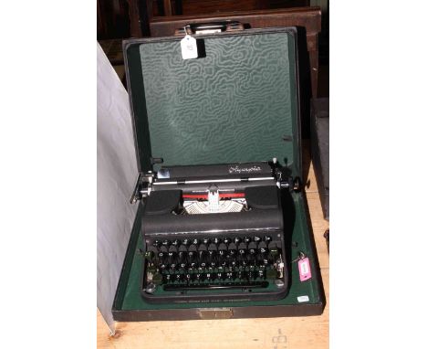 Olympia Werke West, Wilhelmshaven cased typewriter, in little used condition.
