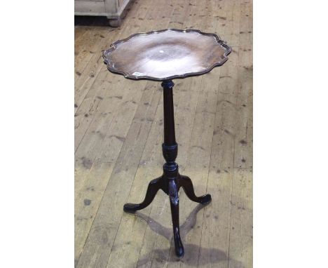 Mahogany circular shaped top tripod side table.