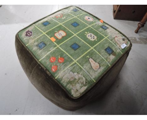 A vintage tapestry topped and dralon footstool