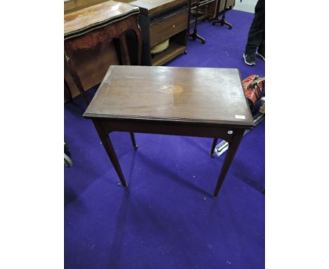 An Edwardian mahogany and inlaid fold over card table, in need of restoration, approx. 69 x 42cm