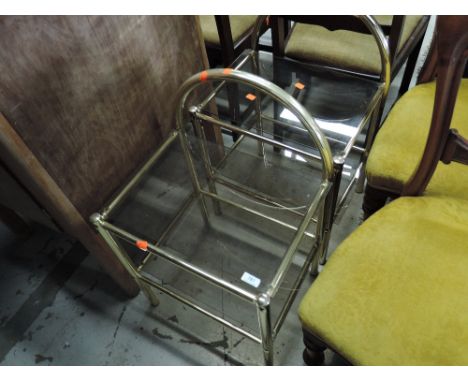 A pair of modern brass bedside or side table, having glass top and undertier, each width approx. 45cm