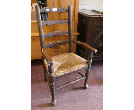 Child's ladder back rush seated armchair 