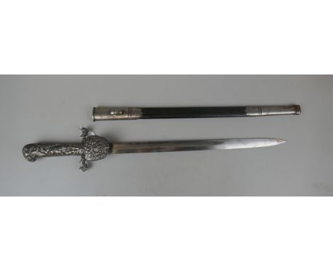 Early C20th hunting dagger. Handle adorned a with hunting scene and scabbard marked with owners name Kurt Burstam Don Doring 