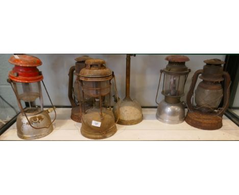 Collection of paraffin lamps to include Tilley lamp 