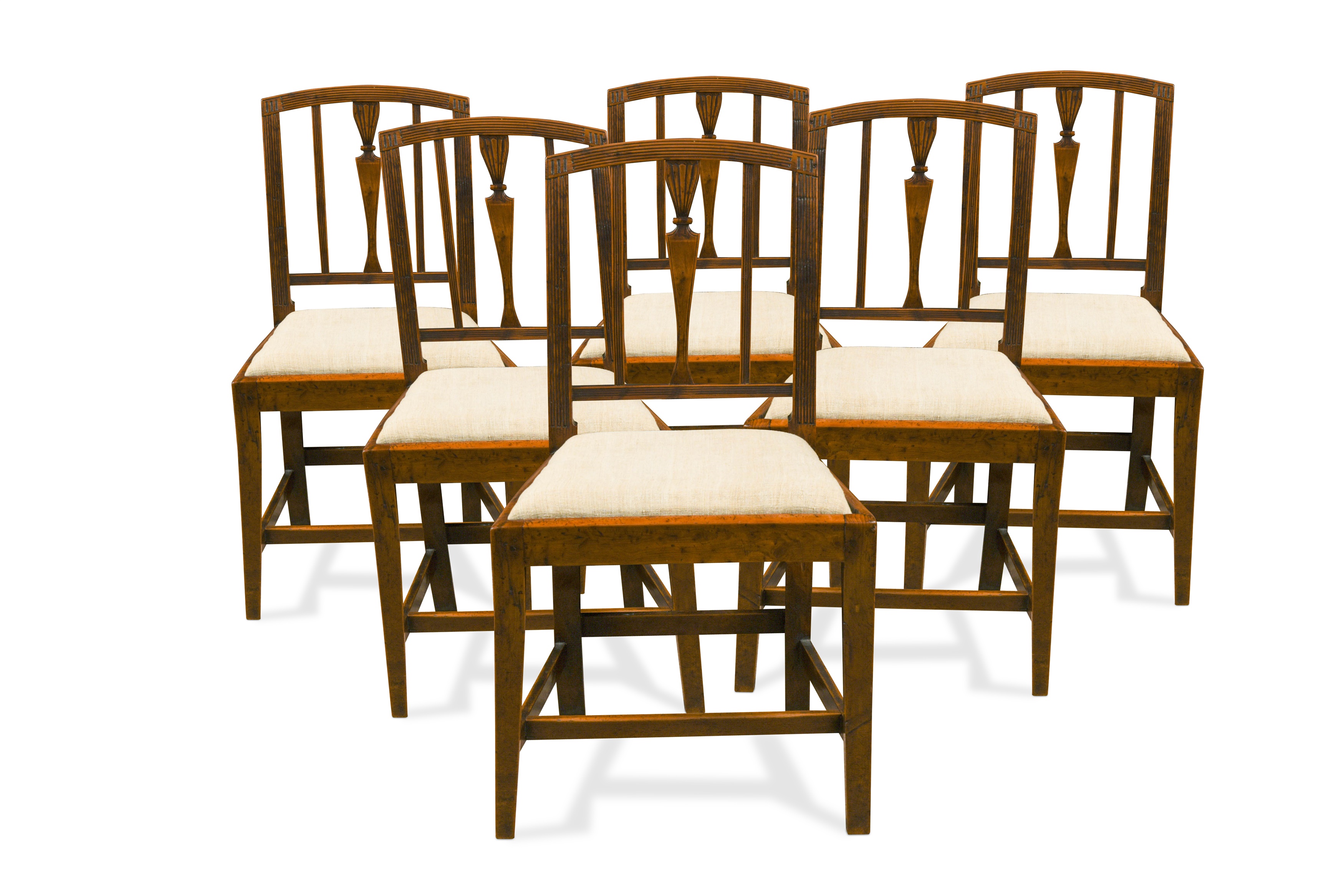 A set of six late George III Sheraton yew wood dining chairs, in ...